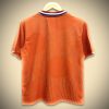 MAILLOTPAYSBASDOMICILE24dos.jpg Nederland Thuisshirt 2025 zijaanzicht