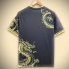 jersey-supporter-real-madrid-style-concept-avec-dragon-dore Supportersshirt Real Madrid conceptstijl met gouden draak