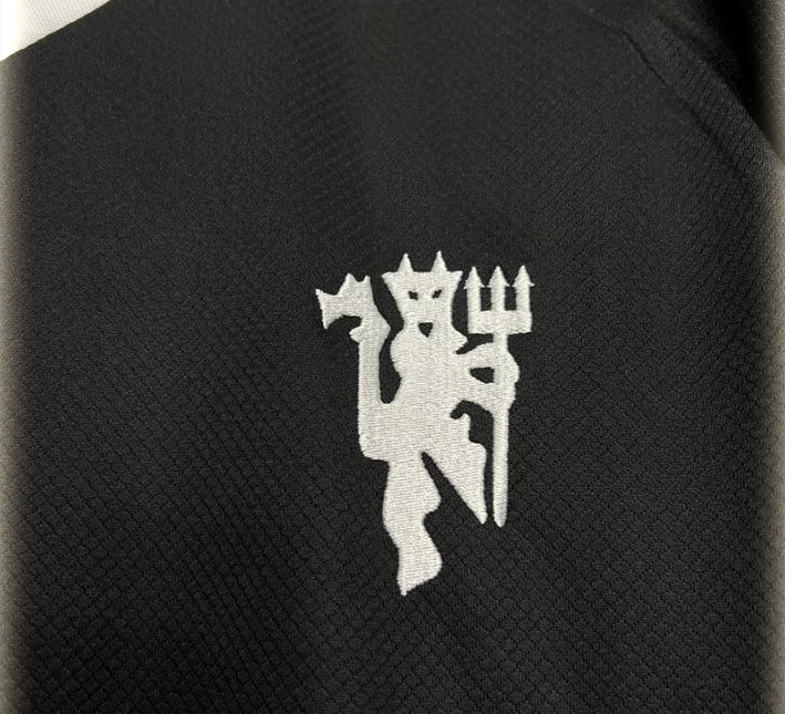 tenue-de-gardien-de-but-manchester-united-noir-manches-longues Zwarte keeperstenue Manchester United lange mouwen