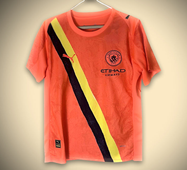maillot-manchester-city-third-orange-2526 Manchester City Derde Shirt Oranje 2526