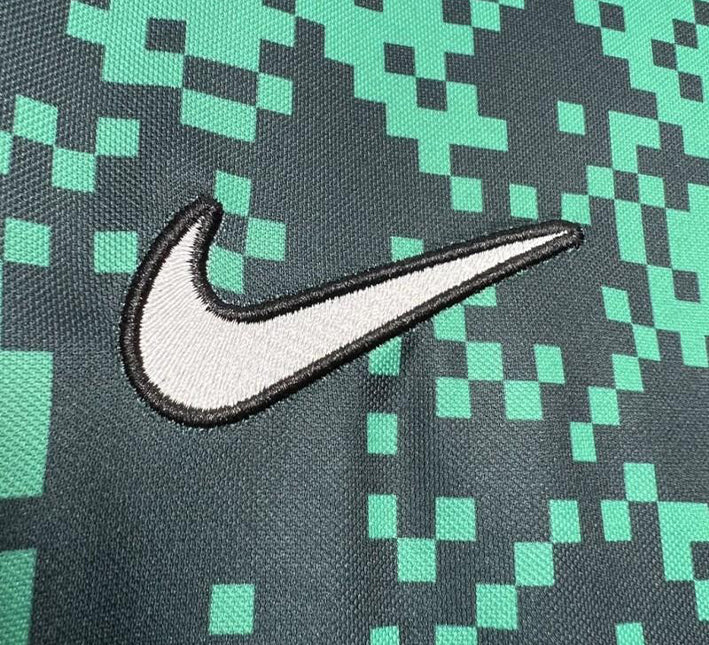 maillotsportingprematchnike.jpg Maillot Sporting CP Avant-Match 2024-2025 detail tissu