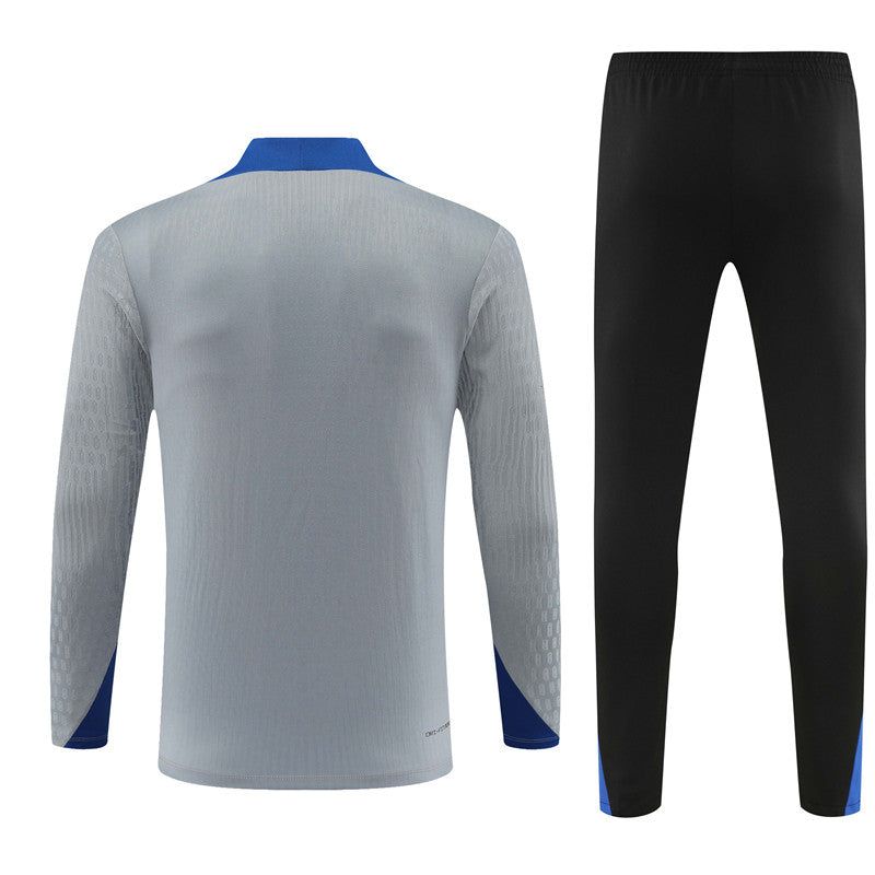 survetement-inter-milan-saison-2024-2025-ensemble-haut-et-bas trainingspak Inter Milan seizoen 2024 2025 set boven- en onderkleding