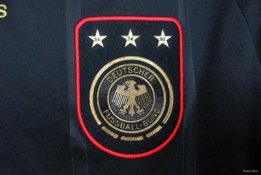 a8bc5390c32310776bb01145_540x_386d2ddf-a6f4-4ad1-a2bc-f274d65fb3cb.jpg Voetbalshirt Duitsland Retro 2010