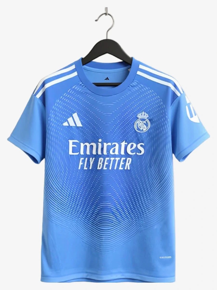 maillot-real-madrid-avant-match-edition-blue-2025-2026 studio v12 Voetbalshirt Real Madrid Voorwedstrijd Editie Blauw 2025-2026